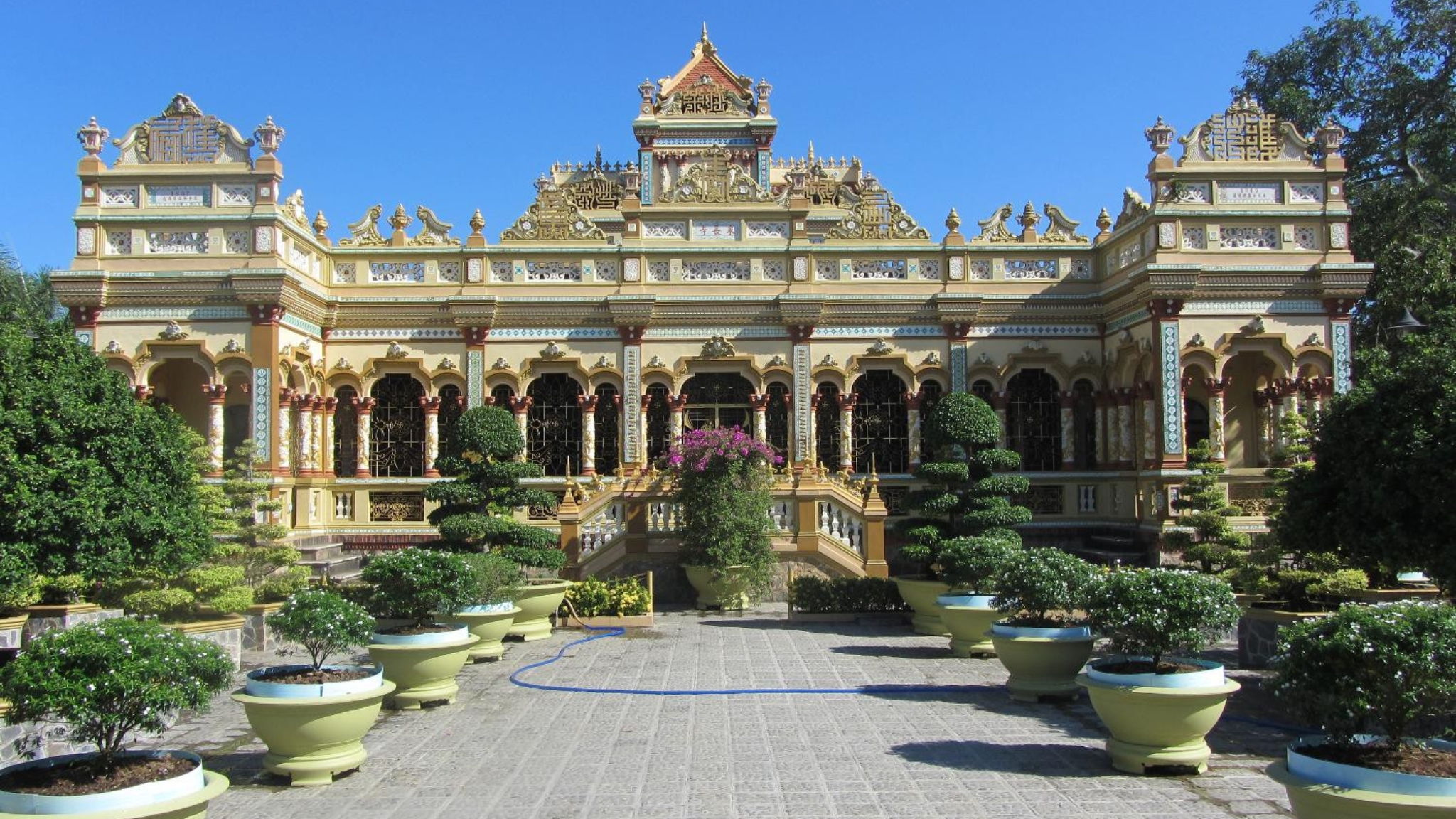 Day 3 Admire The Ornate Beauty Of Vinh Trang Pagoda With Towering Buddha Statues And Peaceful Gardens